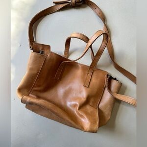 FashionABLE local and global distressed leather shoulder bag in light brown